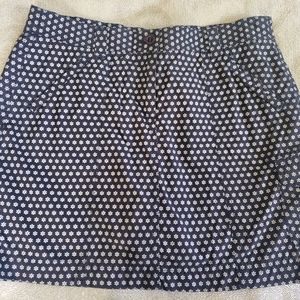 Adorable Skort, navy with white daisy pattern.